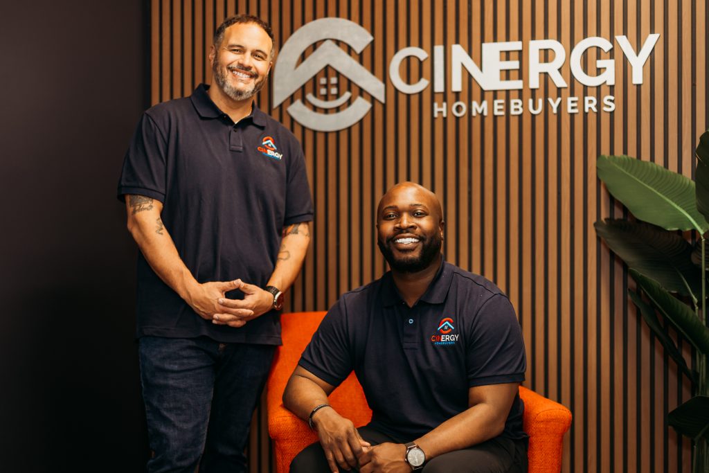 The founders of Cinergy Homebuyers posing for a photo in their office. Thank you for trusting us for a quick sale of your home.